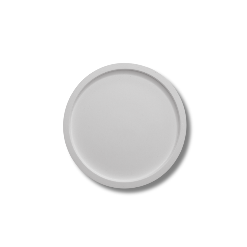 Elegante witte ronde onderzetter, minimalistisch en stijlvol voor elke tafelsetting